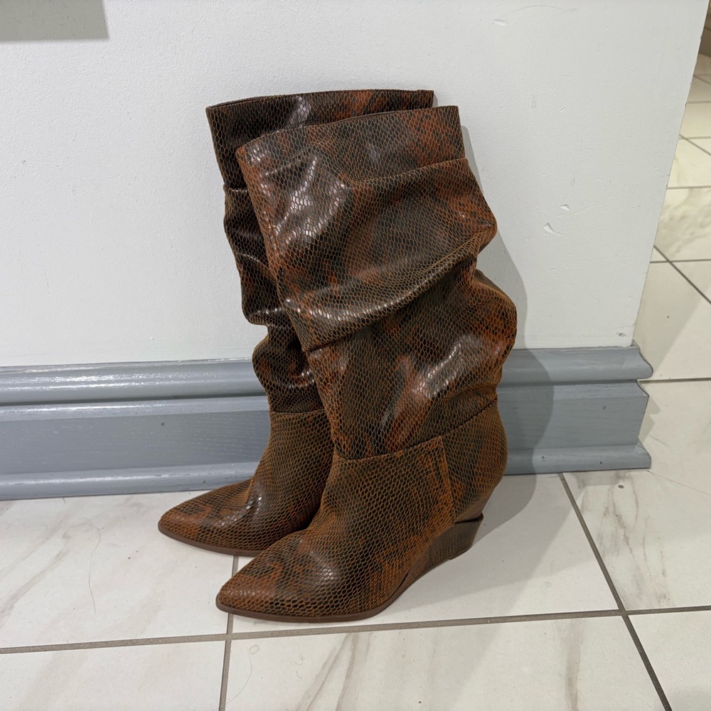 Wedge tall boot.